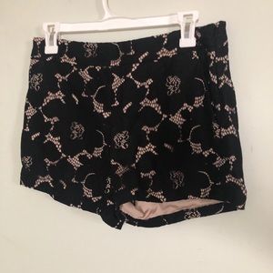 Cute black lace overlay on blush shorts | Express